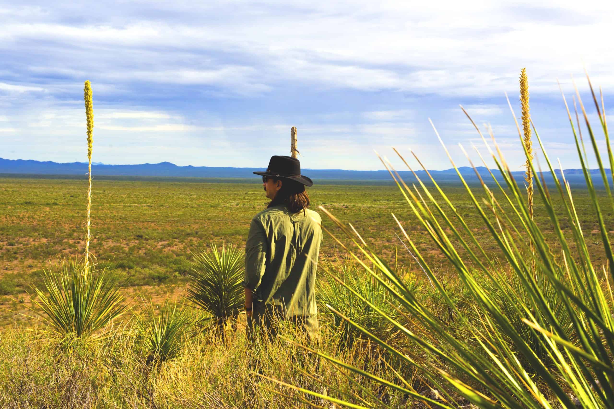 Best things to do in Chihuahua Mexico - Juan Pablo Carvajal with sotol plants overlooking field