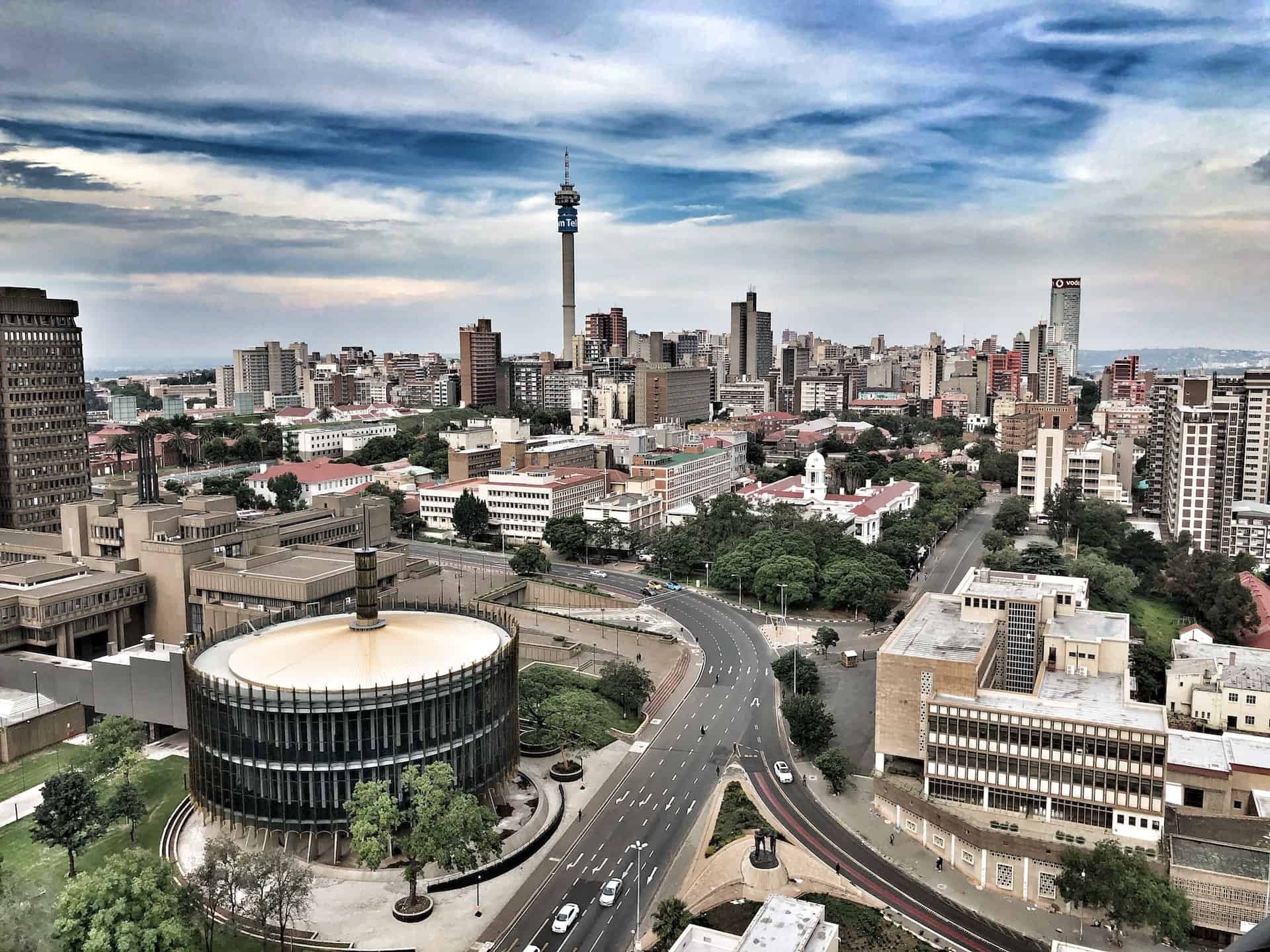 Best things to do in Johannesburg South Africa - Kenzeo Mpoyi - Johannesburg skyline by Clodagh Da Paixao on Unsplash
