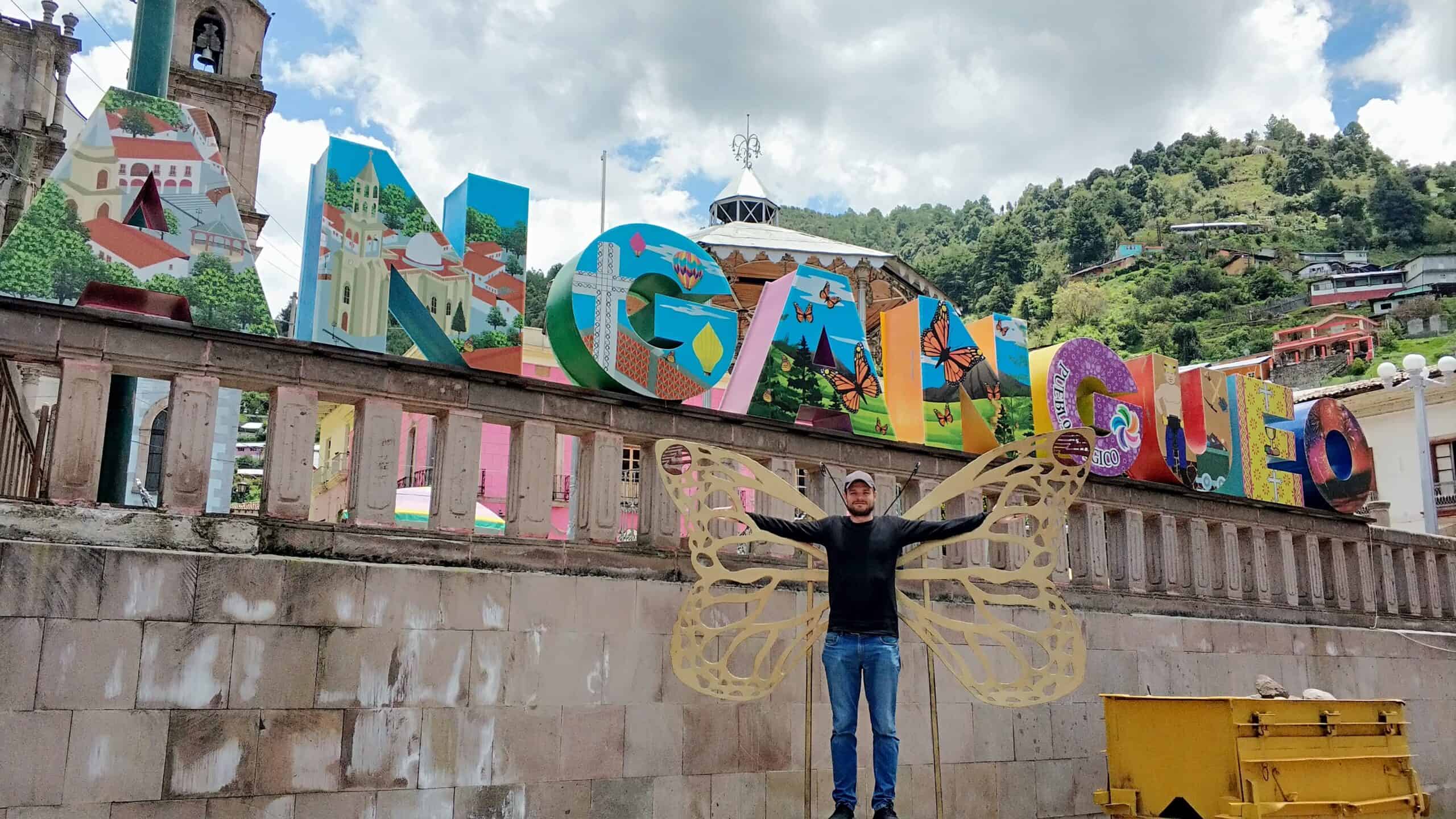 Best things to do in Mexico City Mexico - Alex Veka with local sign