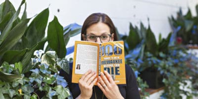 Best things to do in Milwaukee Wisconsin Jenna Kashou with book