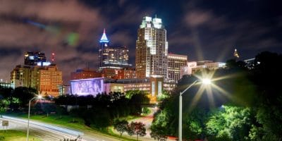 Best things to do in Raleigh North Carolina - Steve Mangano - Raleigh skyline at night by Higgins Spooner on Unsplash