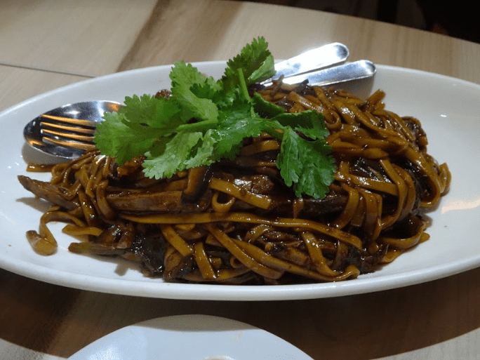 Best things to do in Kuala Lumpur Malaysia Grant Samson char kway teow noodle dish