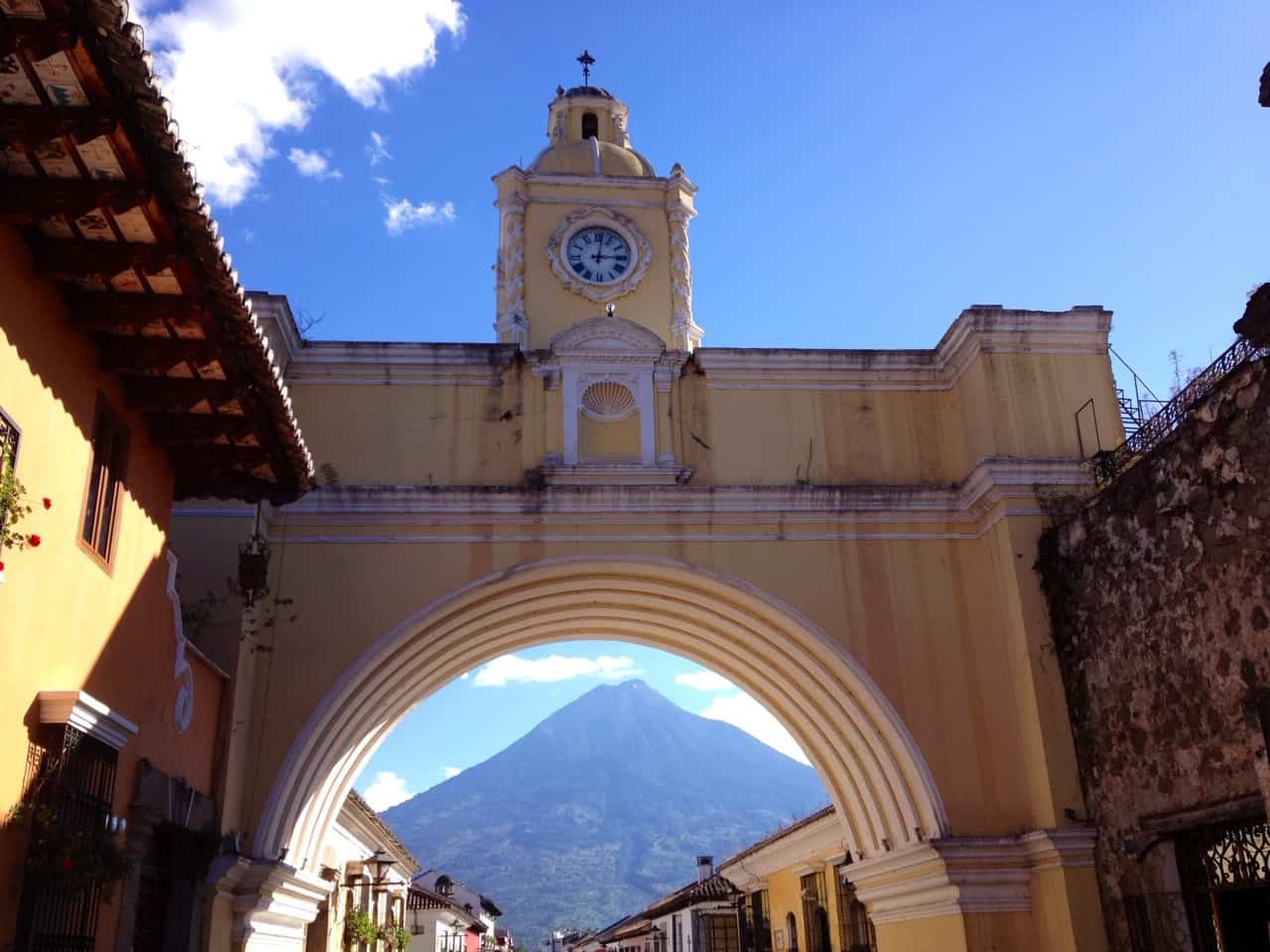 Best things to do in Guatemala City Guatemala Cesar Tanchez Antigua Guatemala El Arco de Santa Catalina with Volcán de Agua