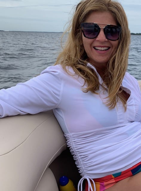 Best things to do in Panama City Florida - Jan Johnson on a pontoon boat
