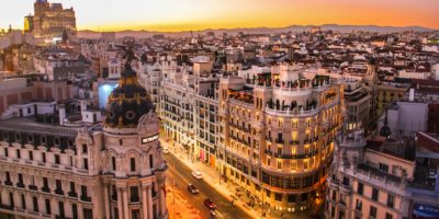 Best things to do in Madrid Spain - Janelle Norman - Sunset view of Calle Gran Via - courtesy of Florian Wehde on Unsplash