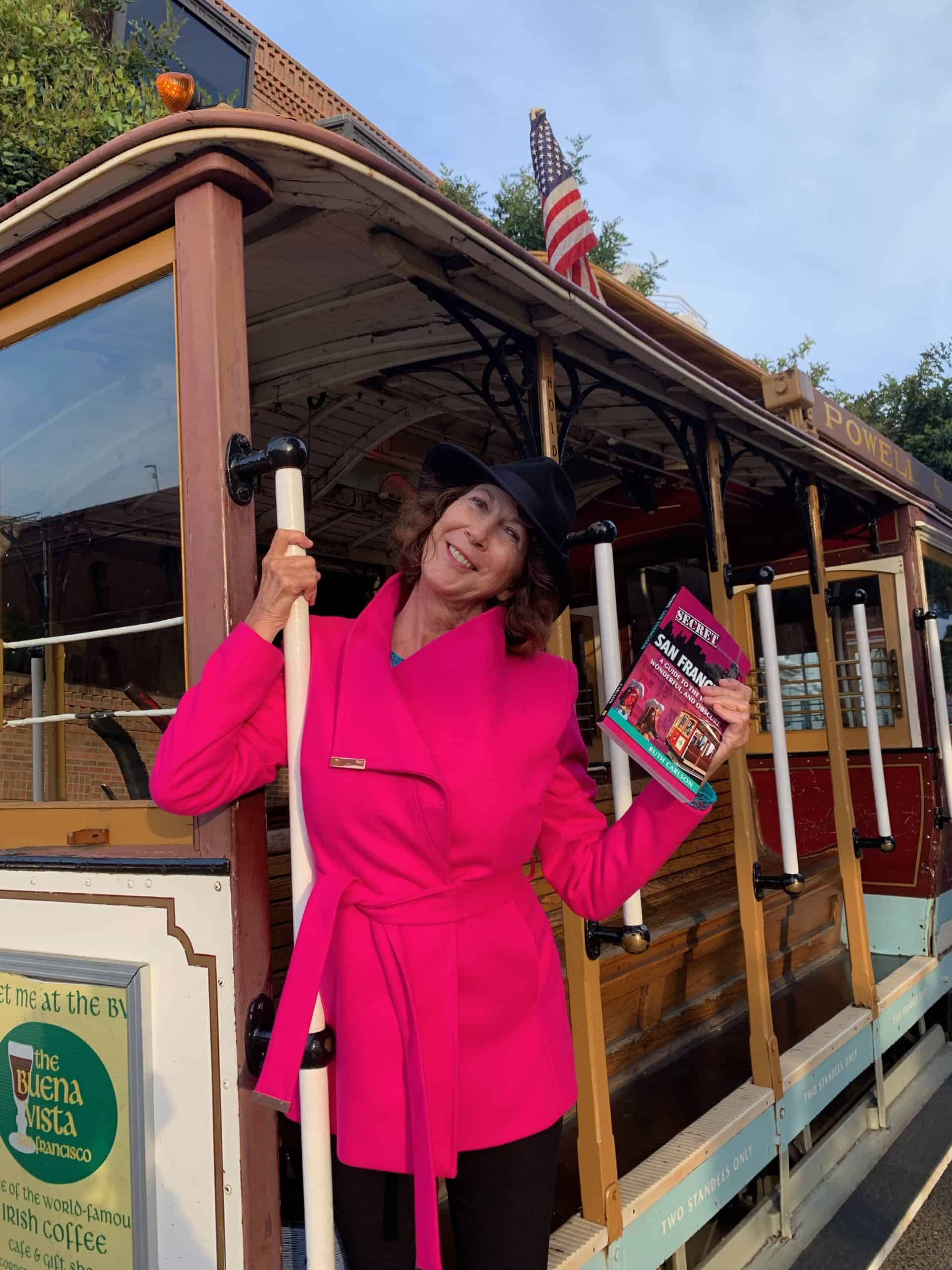 Best things to do in San Francisco California - Ruth Carlson on trolley with book
