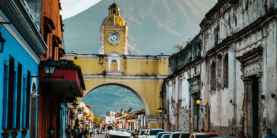 Best things to do in Antigua Guatemala - Katrina Julia - Santa Catalina Arch with Volcán de Agua by Parker Hilton on Unsplash v1