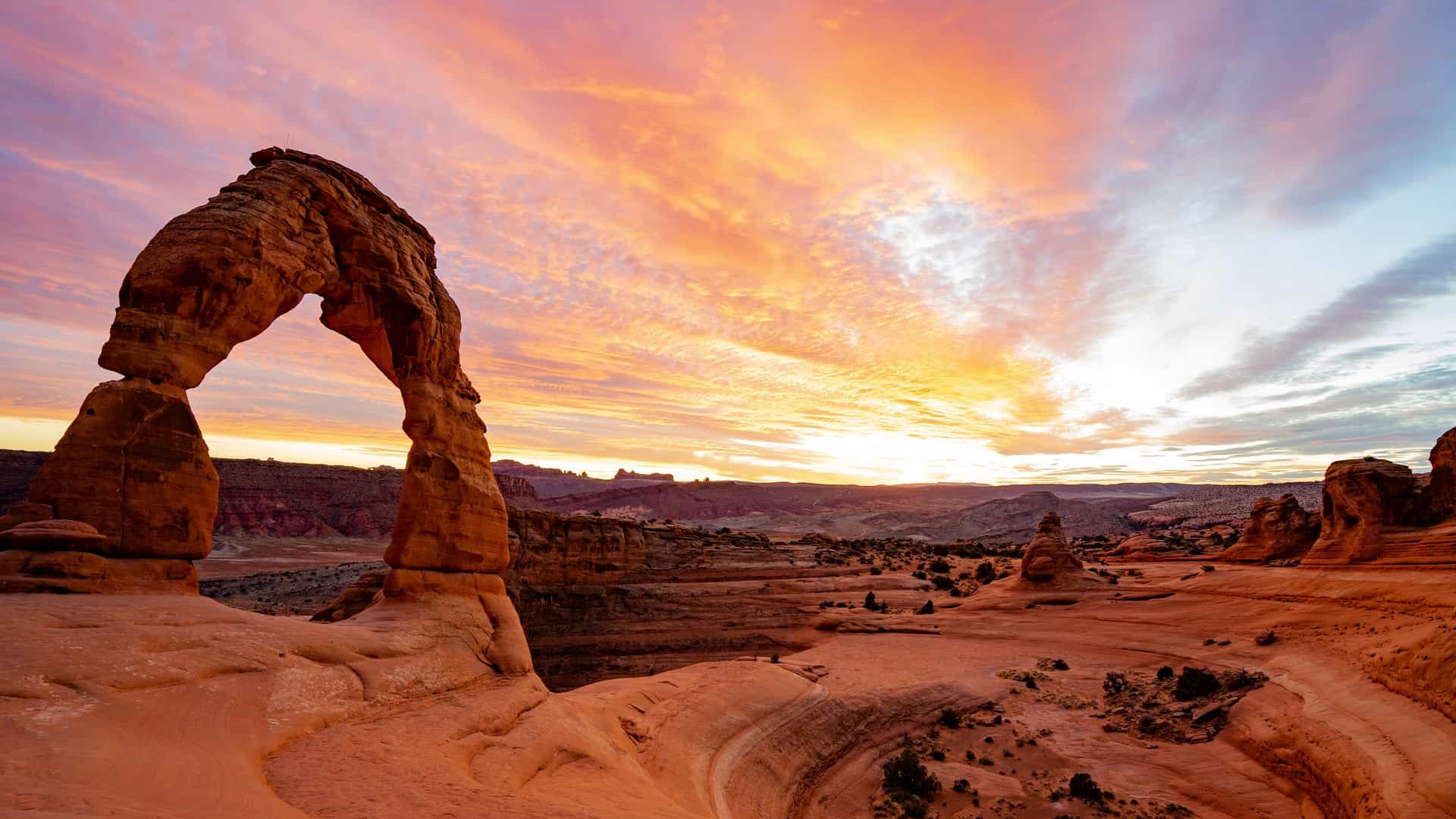 Best things to do in Moab Utah - Rosanne McHenry - Delicate Arch at Arches National Park by Tom Gainor on Unsplash