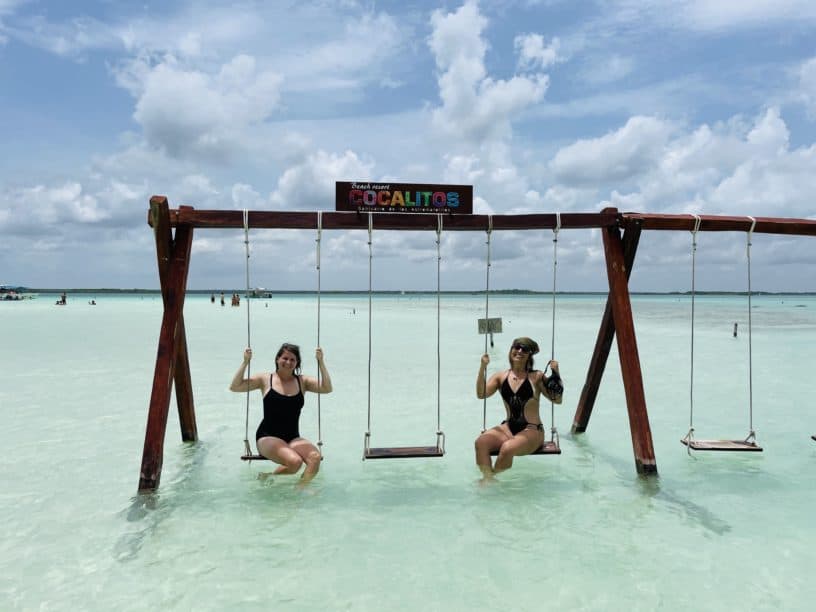 Best things to do in Bacalar Mexico - Katrina Julia - Cocalito's swing in the ocean