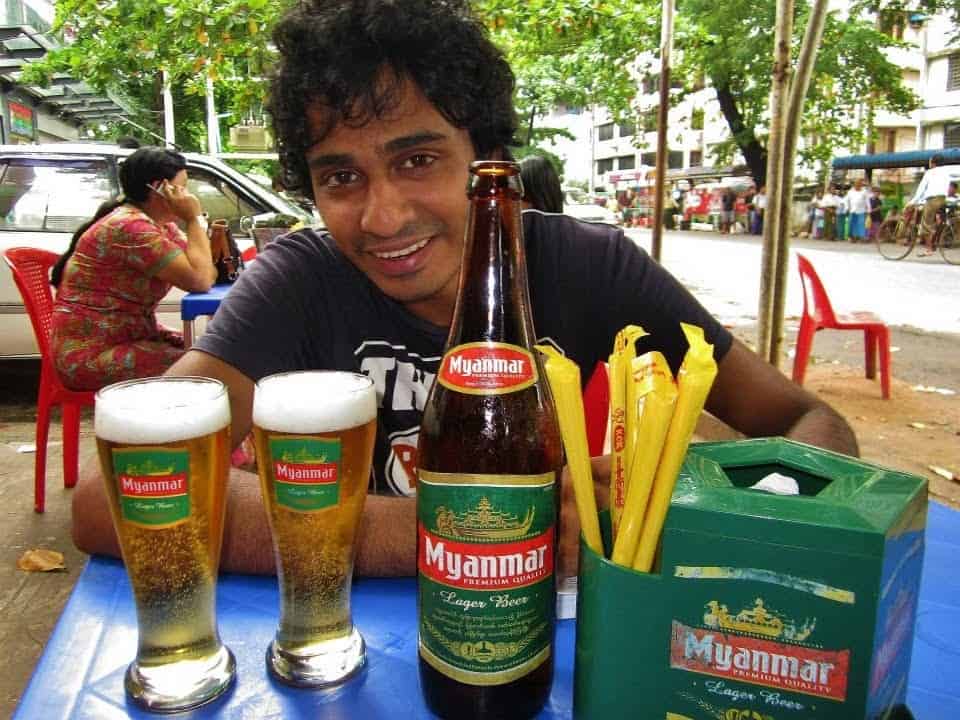 Best things to do in Yangon Myanmar - Jessica Mudditt - Sherpa enjoying Myanmar Beer