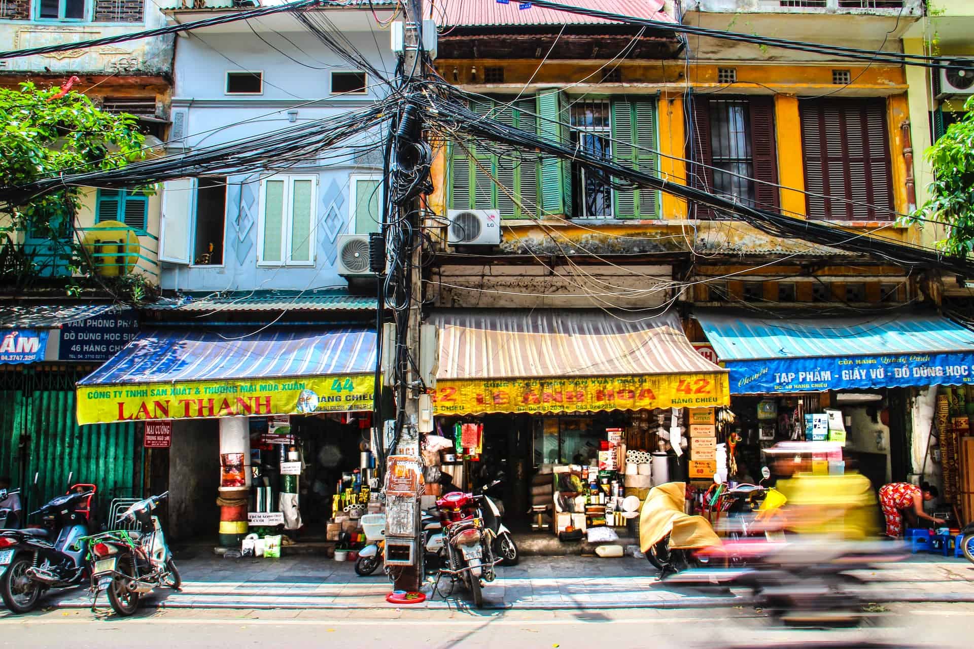 Best things to do in Hanoi Vietnam - Paul Kennedy - Street life in old quarter by Florian Wehde on Unsplash
