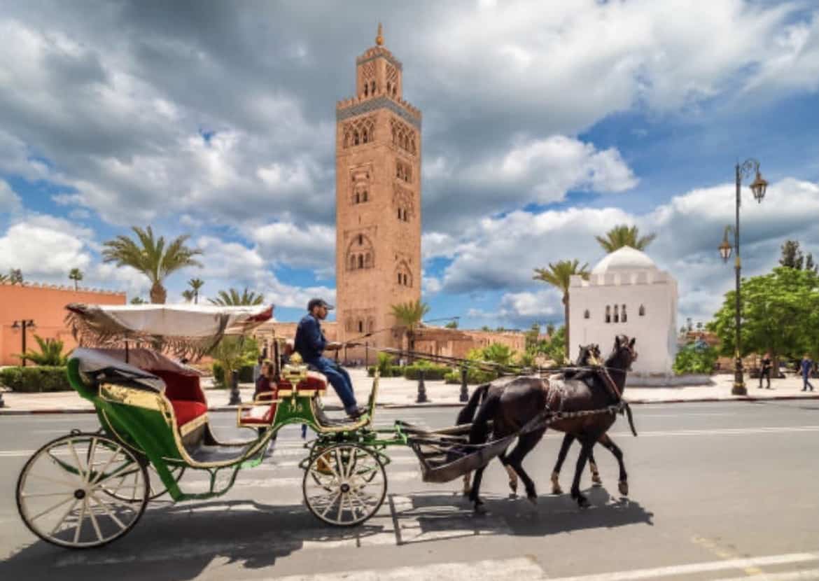 Best things to do in Marrakech Morocco - Daniel and Izdihar Skidmore - Koutoubia Mosque and horse & carriage
