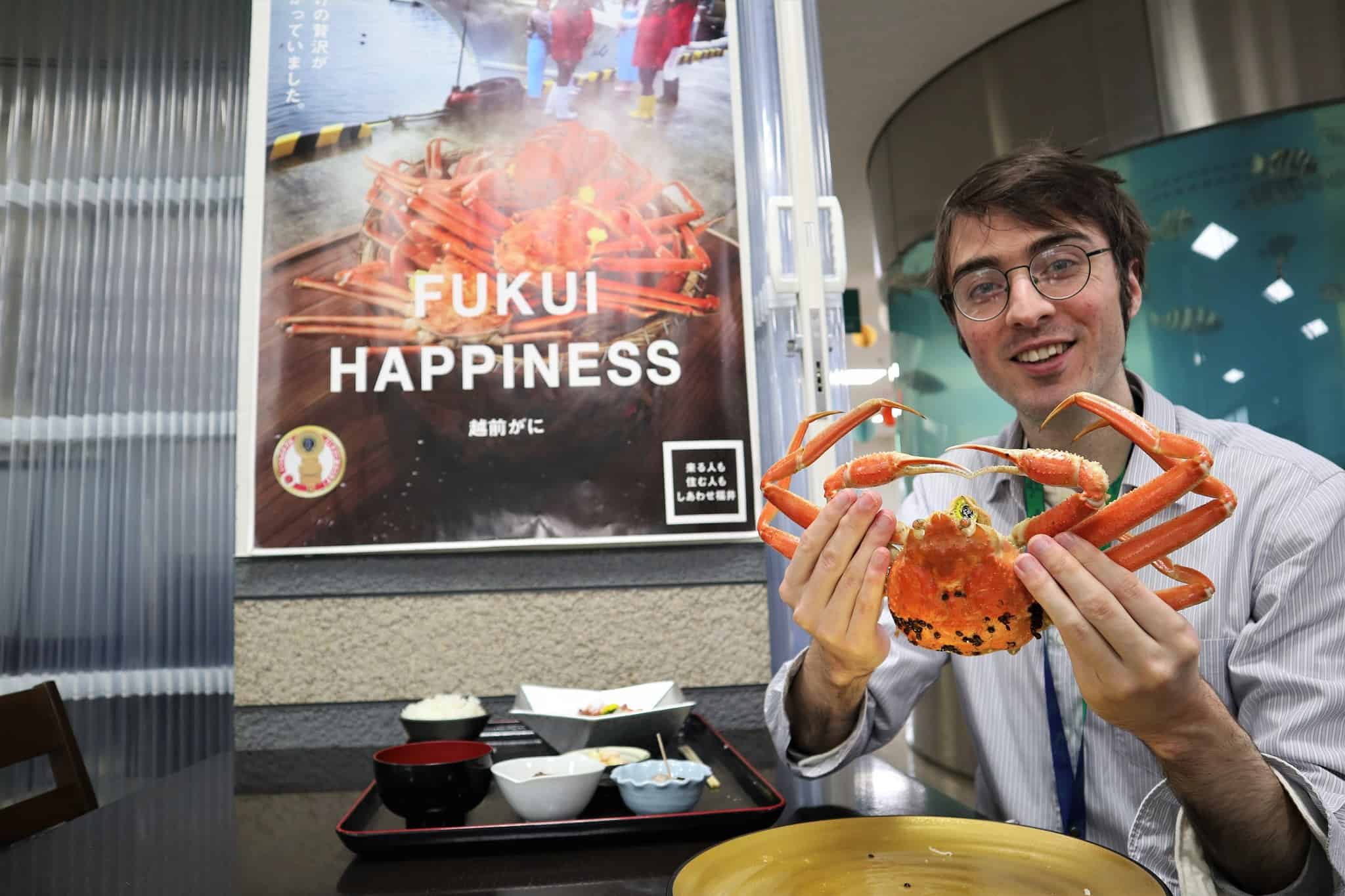 Best things to do in Fukui Japan - Pierre - Eating an Echizen Gani snow crab on the Echizen Coast