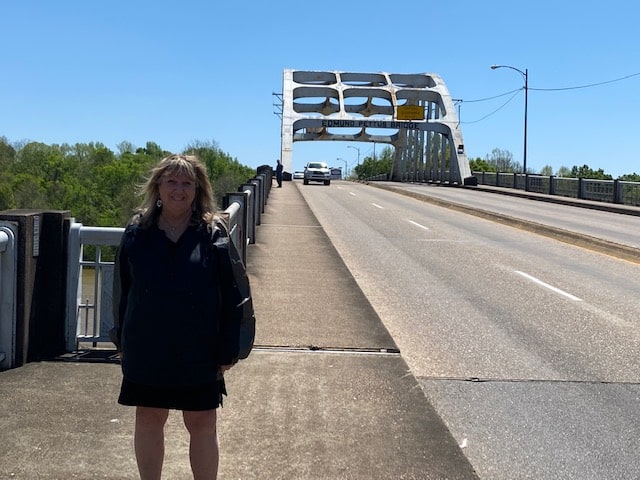 Alabama Civil Rights Trail - Mira Temkin crossing the Edmund Pettus Bridge
