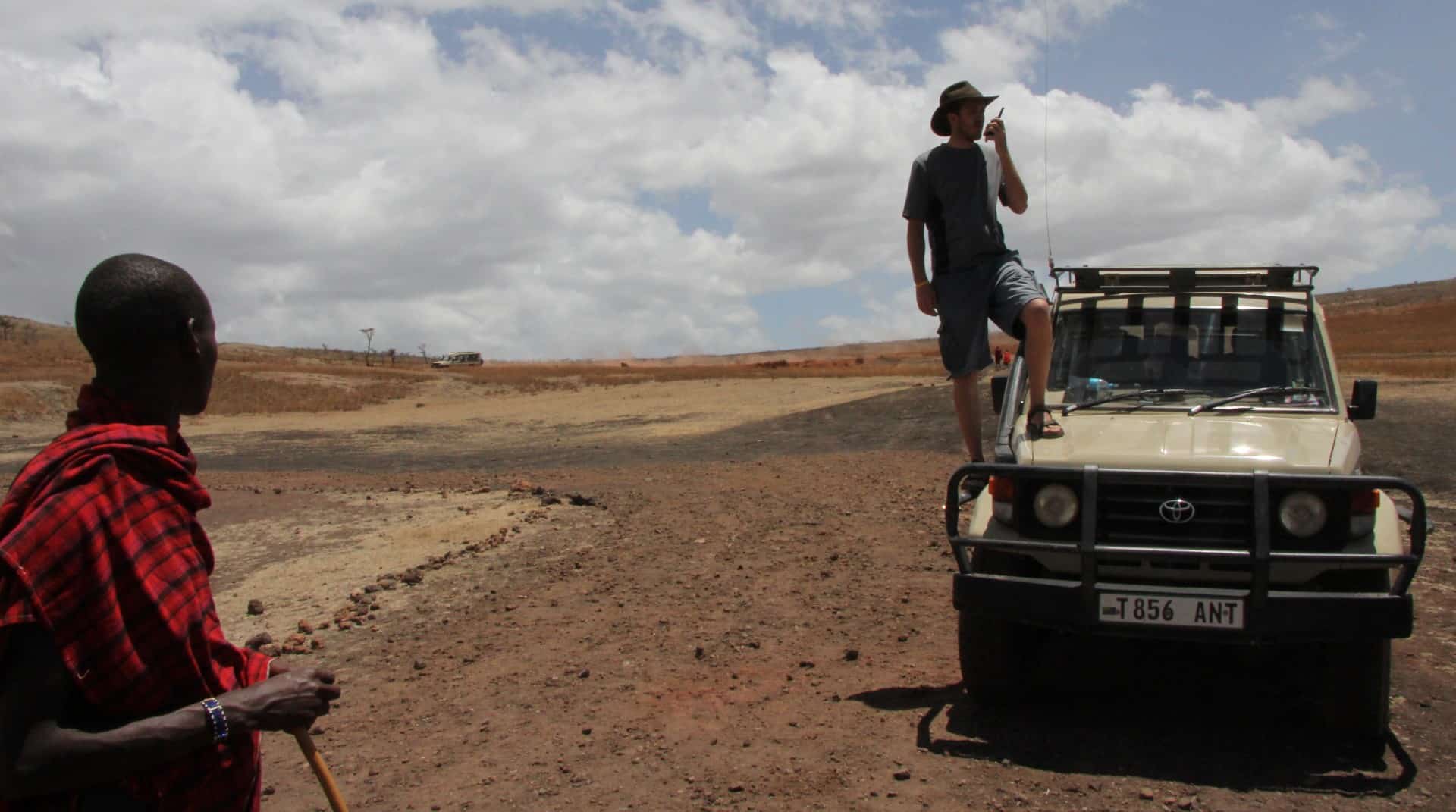 Best things to do in Arusha Tanzania - Scott Brills - Talking on a walky talky while on safari