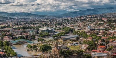 Best things to do in Tbilisi Georgia - Paul McDougal - Aerial view of Tbilisi by giorgi gvilava on Unsplash