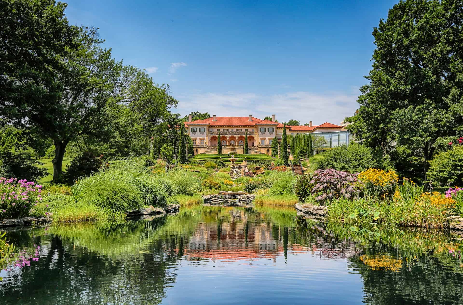 Best things to do in Tulsa Oklahoma - Kevin Matthews II - Philbrook Museum of Art with lake by Mick Haupt on Unsplash