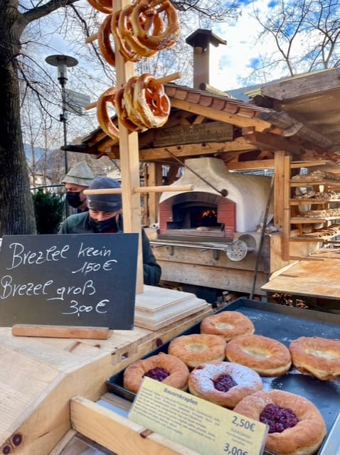 Best things to do in Bolzano Italy - Kecia Welt - Cart selling fresh pastries