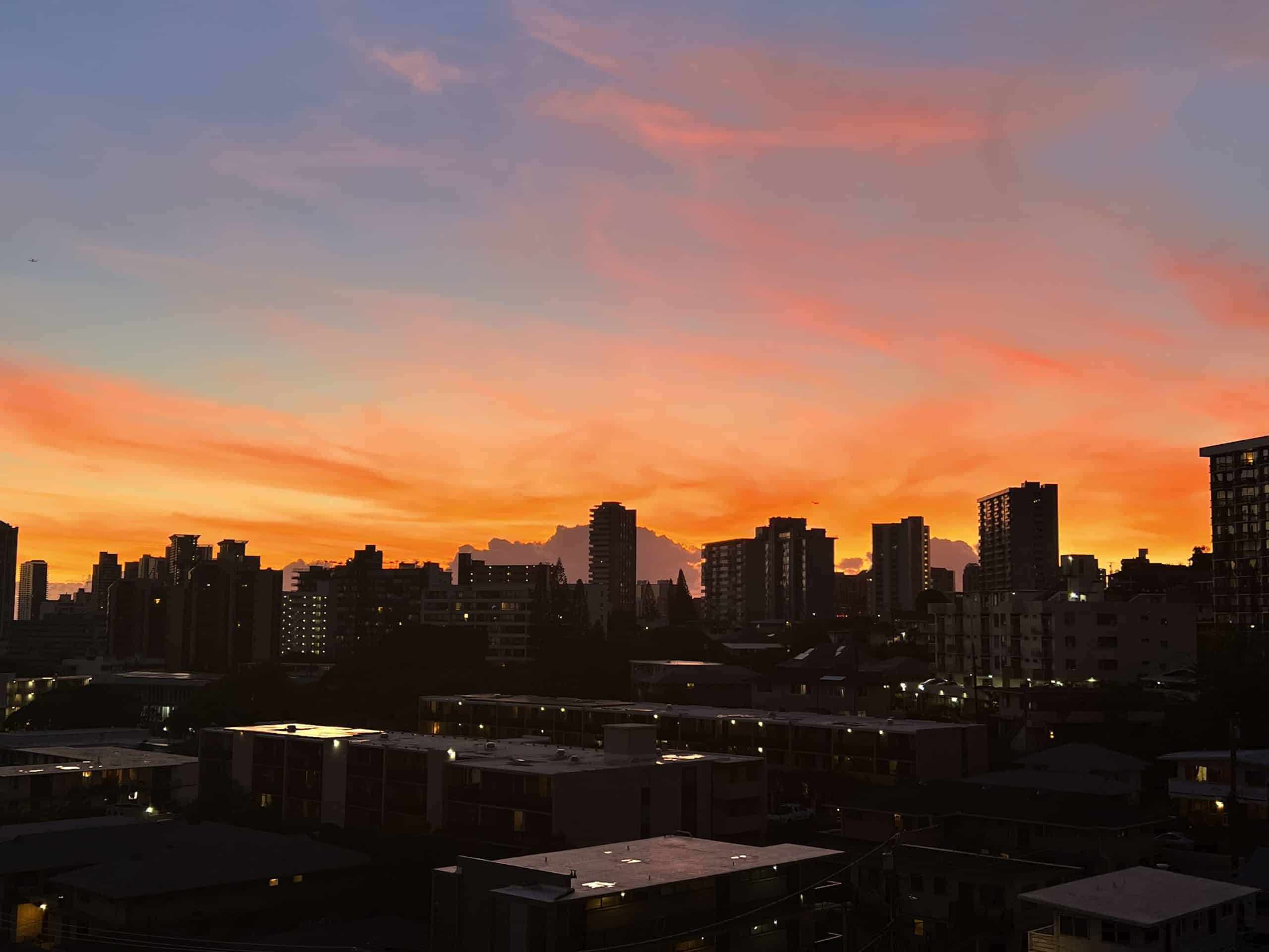 Best things to do in Honolulu Hawaii - Claire Tak - Sunset in Honolulu from my balcony
