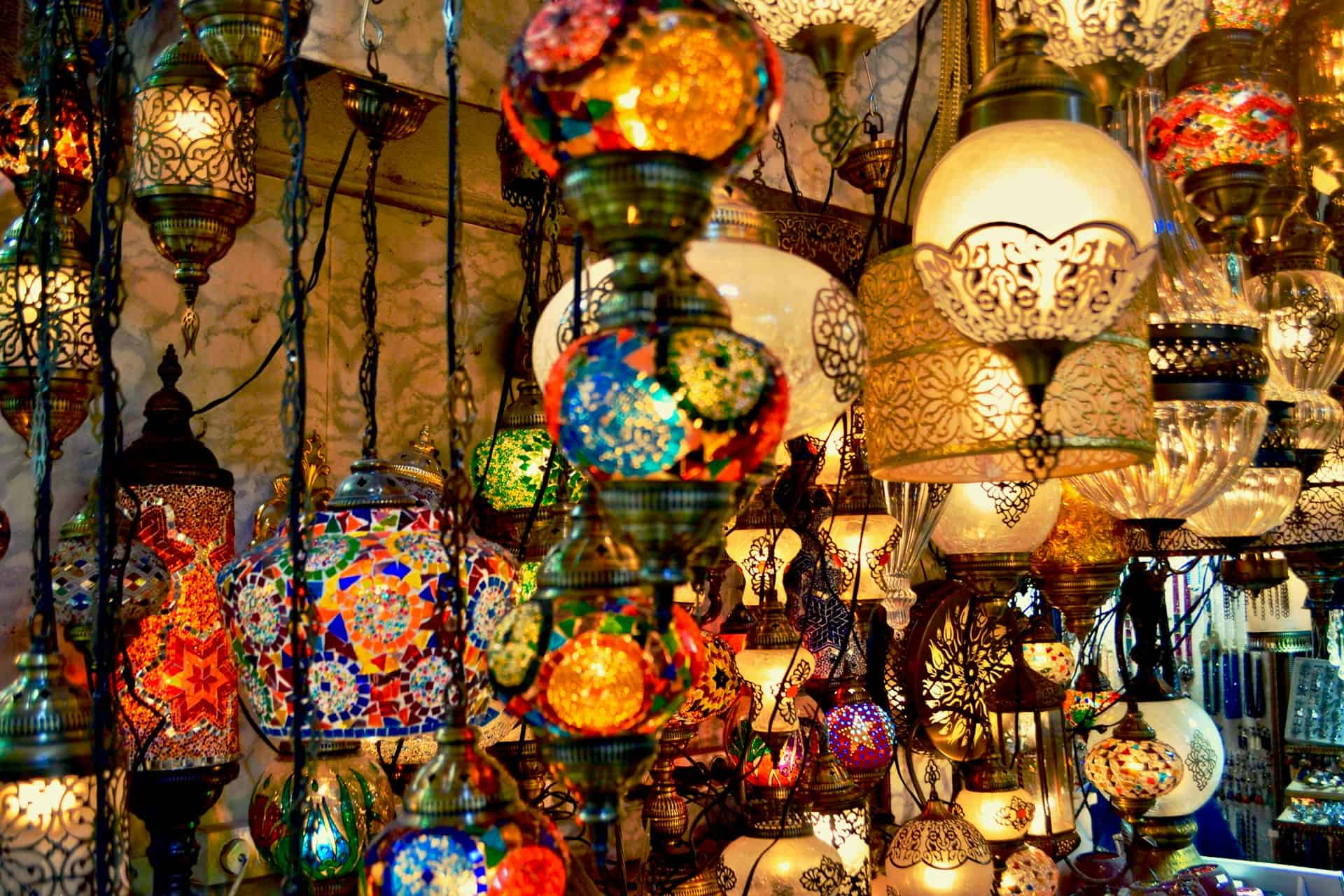 Best things to do in Istanbul Turkey - Pinar Tarhan - Colorful lamps in the shops of the Old Bazaar by riddywankenobi on Unsplash