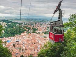 Best things to do in Brasov Romania - Marius Iliescu - Aerial tramway by Zoltan Rakottyai on Unsplash 1600x1200 (1)