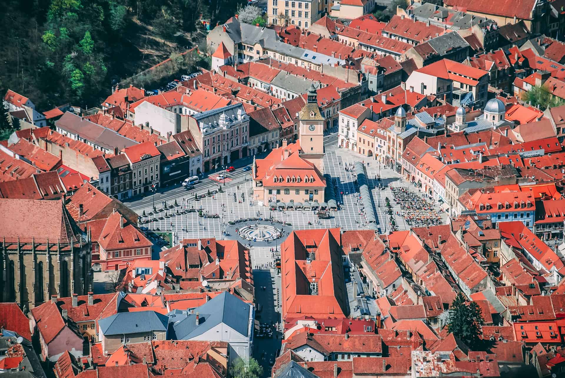 Best things to do in Brasov Romania - Marius Iliescu - Council Square by Dan Novac on Unsplash (1)