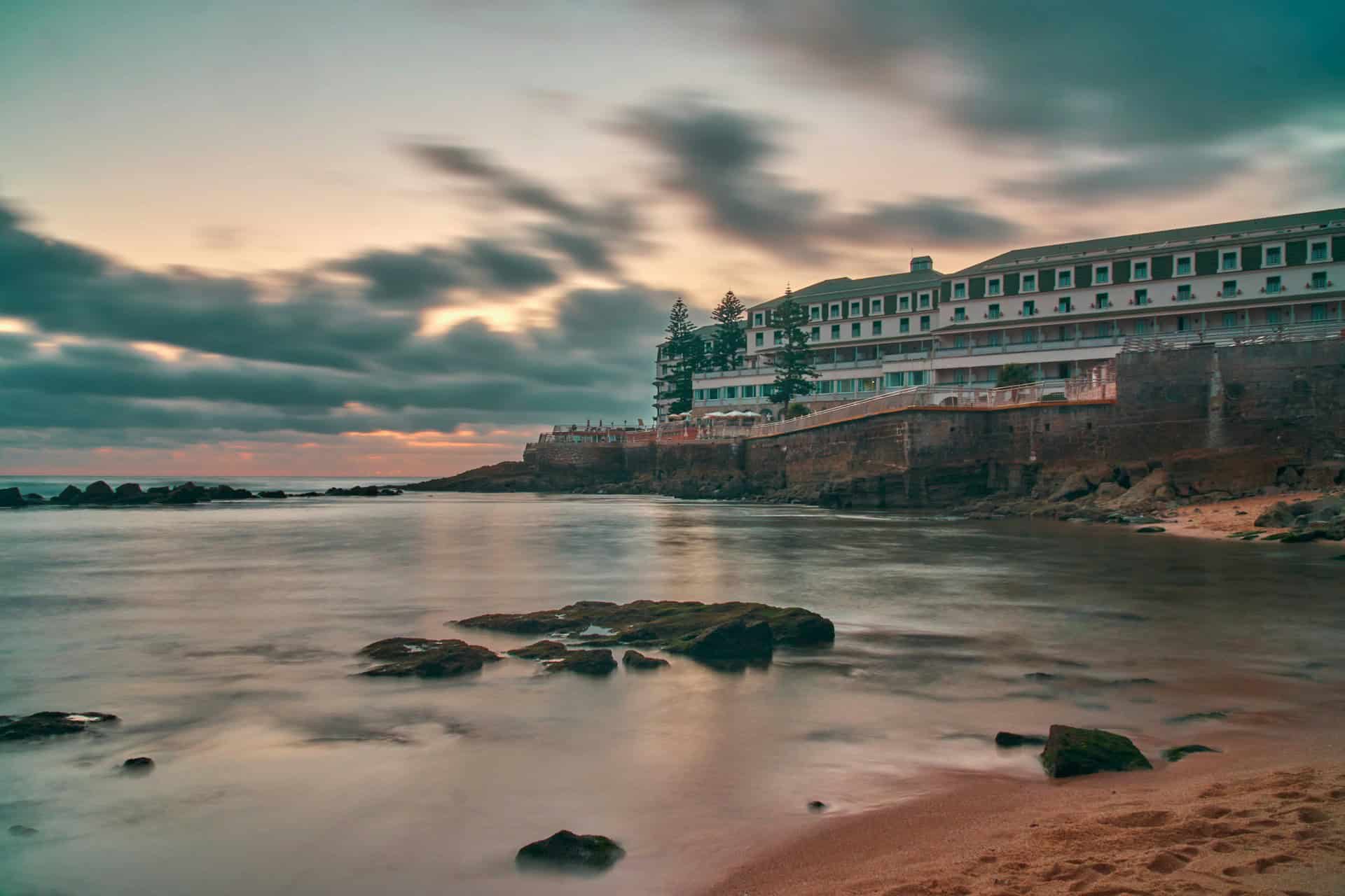 Best things to do in Ericeira Portugal - Rachel Covert - Hotel Vila Galé Ericeira at sunset by Pitua Sutanto on Unsplash