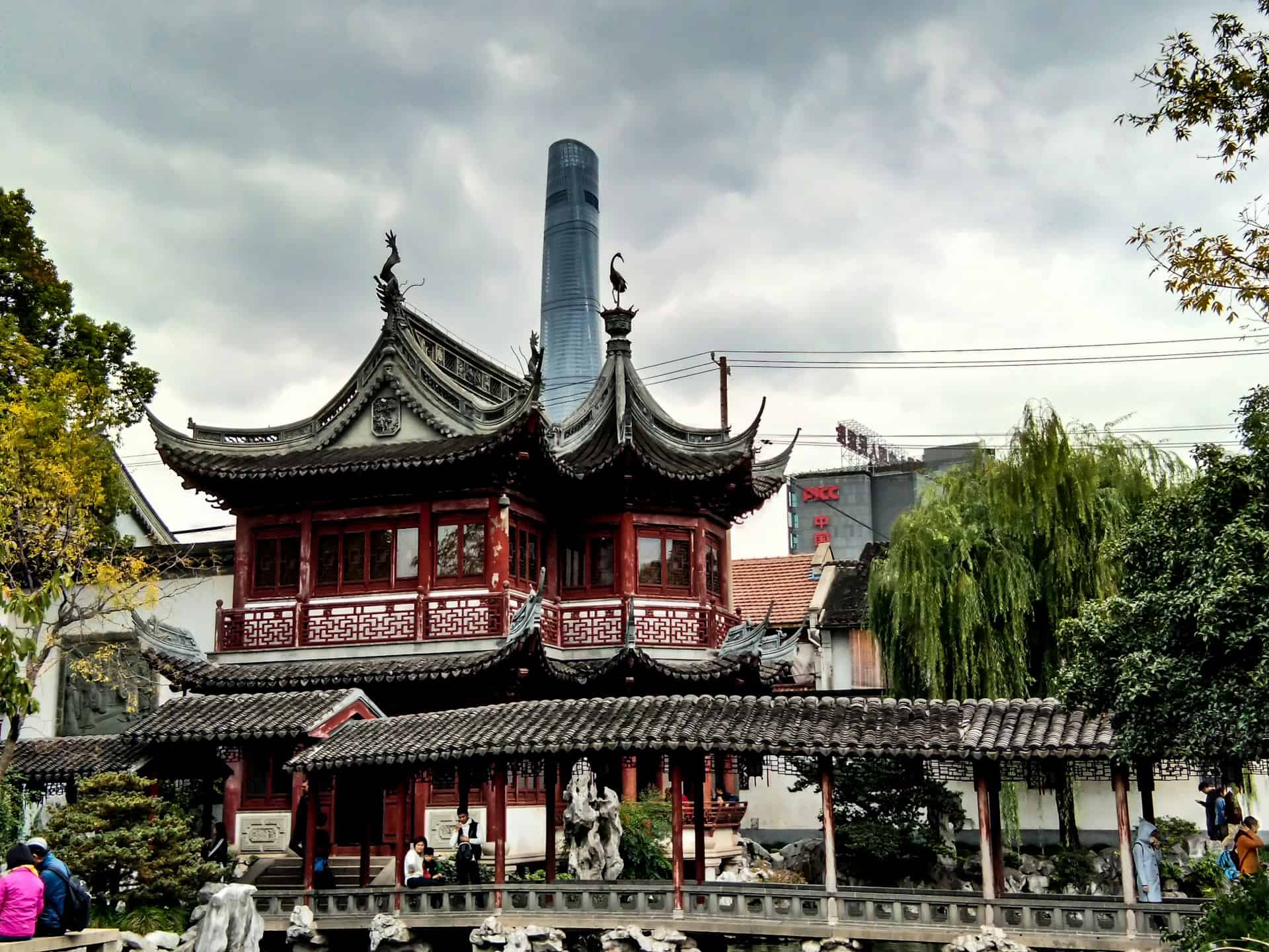 Best things to do in Shanghai China - Brantley Turner - View of the Shanghai tower form the Yu Garden by Timothee Gidenne on Unsplash